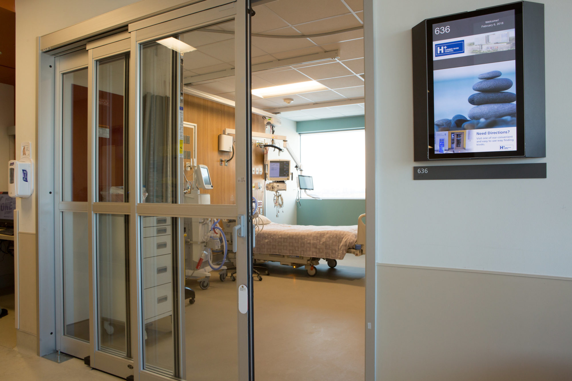 A negative pressure ICU room. The glass doors are sliding shut.