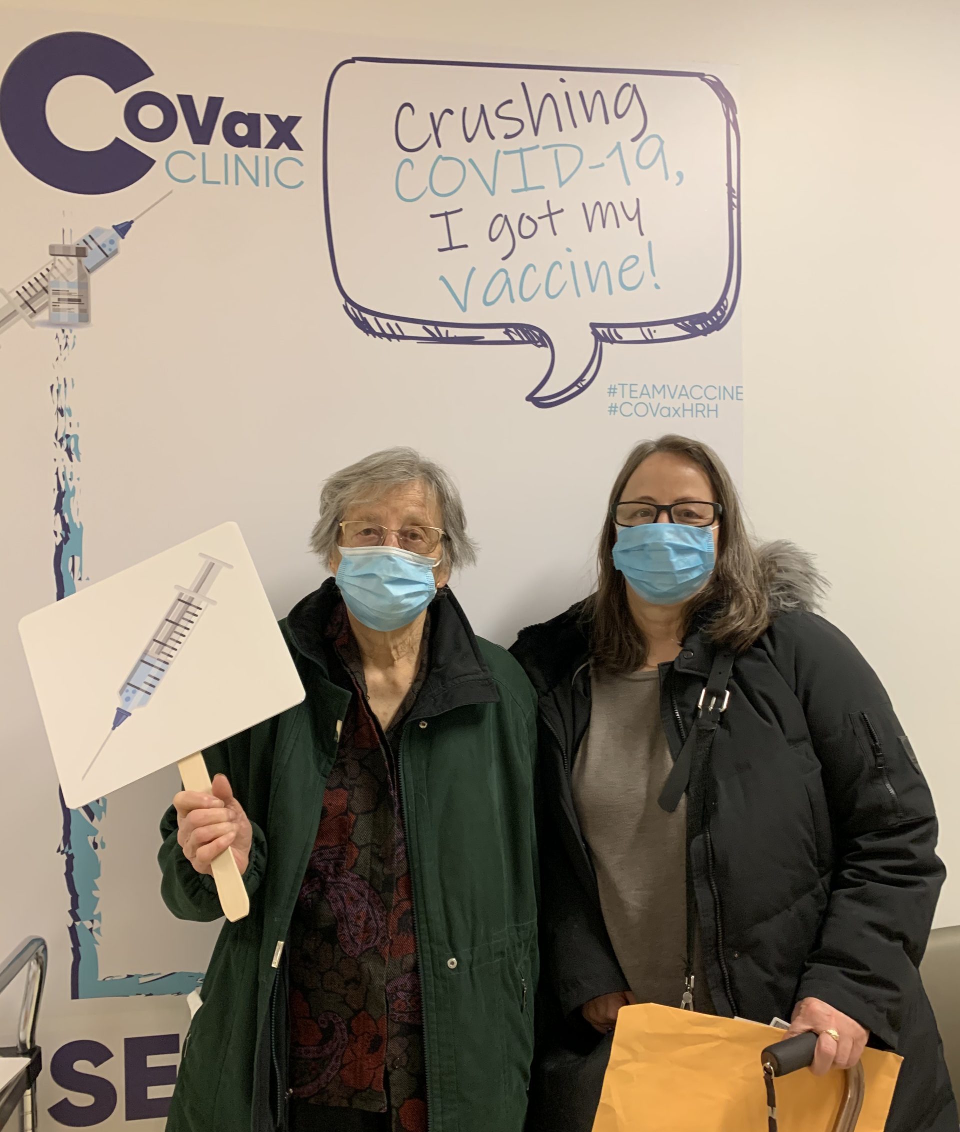 Monthly Donor Mara and her mother at the COVID vaccine clinic