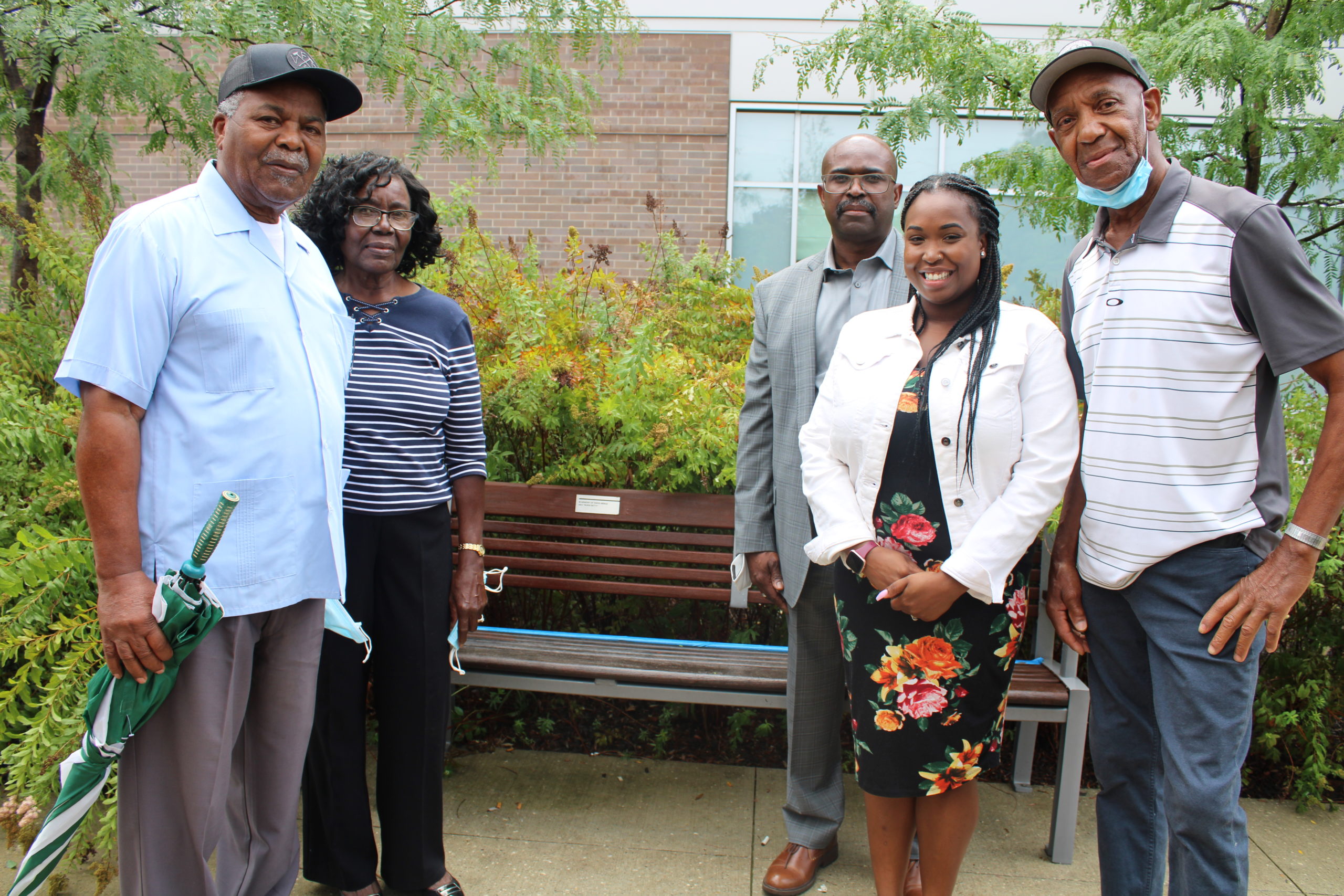 Tanya's Family poses with her bench