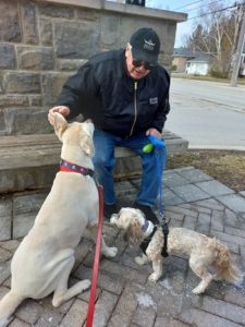 Dr. Lazar Klein's patient Sam with his dogs